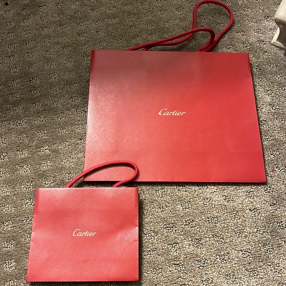 Cartier shopping bags larger one $15 smaller one $10